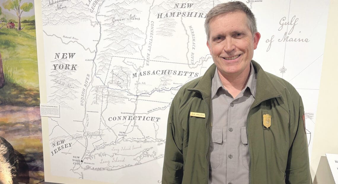 Alan Amelinckx stands by a map tracing the path of Col. Henry Knox’s Noble Train of Artillery.