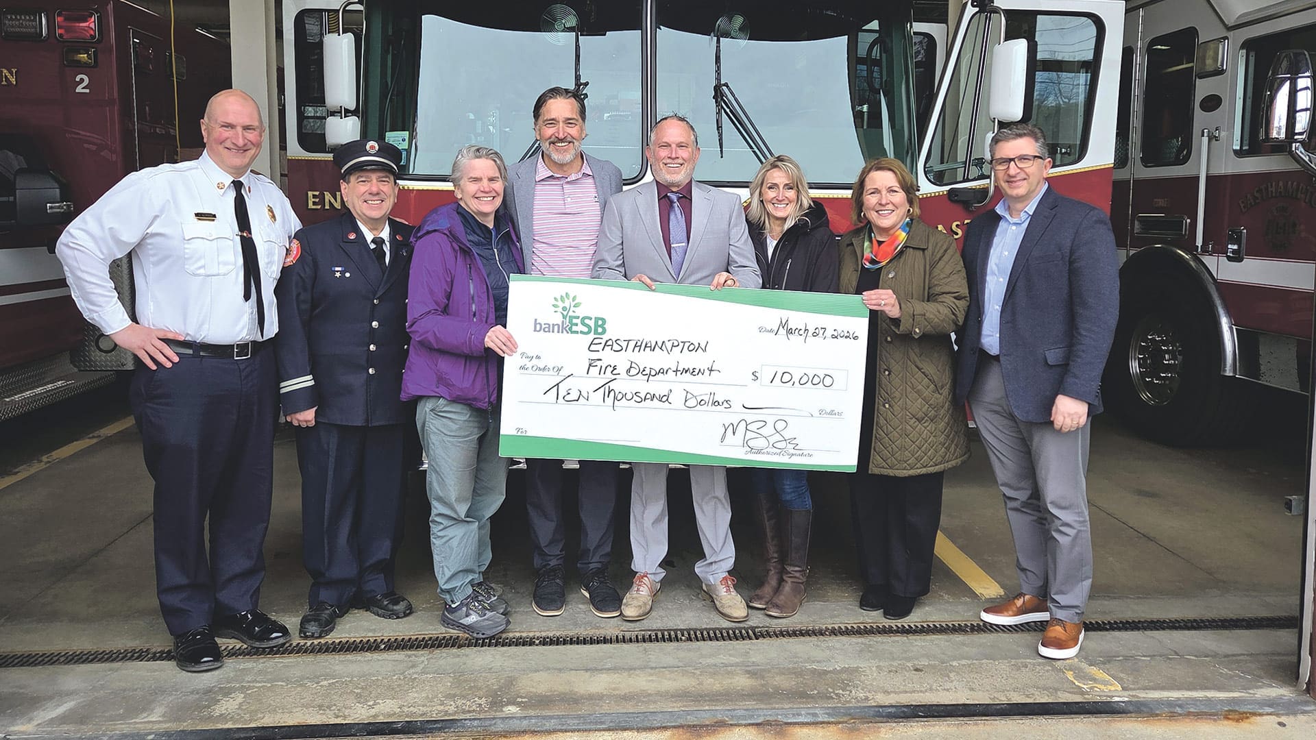 Pictured from left: Easthampton Fire Department Chief Christopher Norris and Captain Daniel Constantine; Easthampton City Council President Koni Denham; bankESB President Matthew Sosik; Easthampton Mayor Salem Derby; and bankESB Assistant Vice President and Branch Officer Jessica West, Executive Vice President and Chief Administrative Officer Bozena Dabek, and Senior Vice President of Retail Banking Gary Turku.