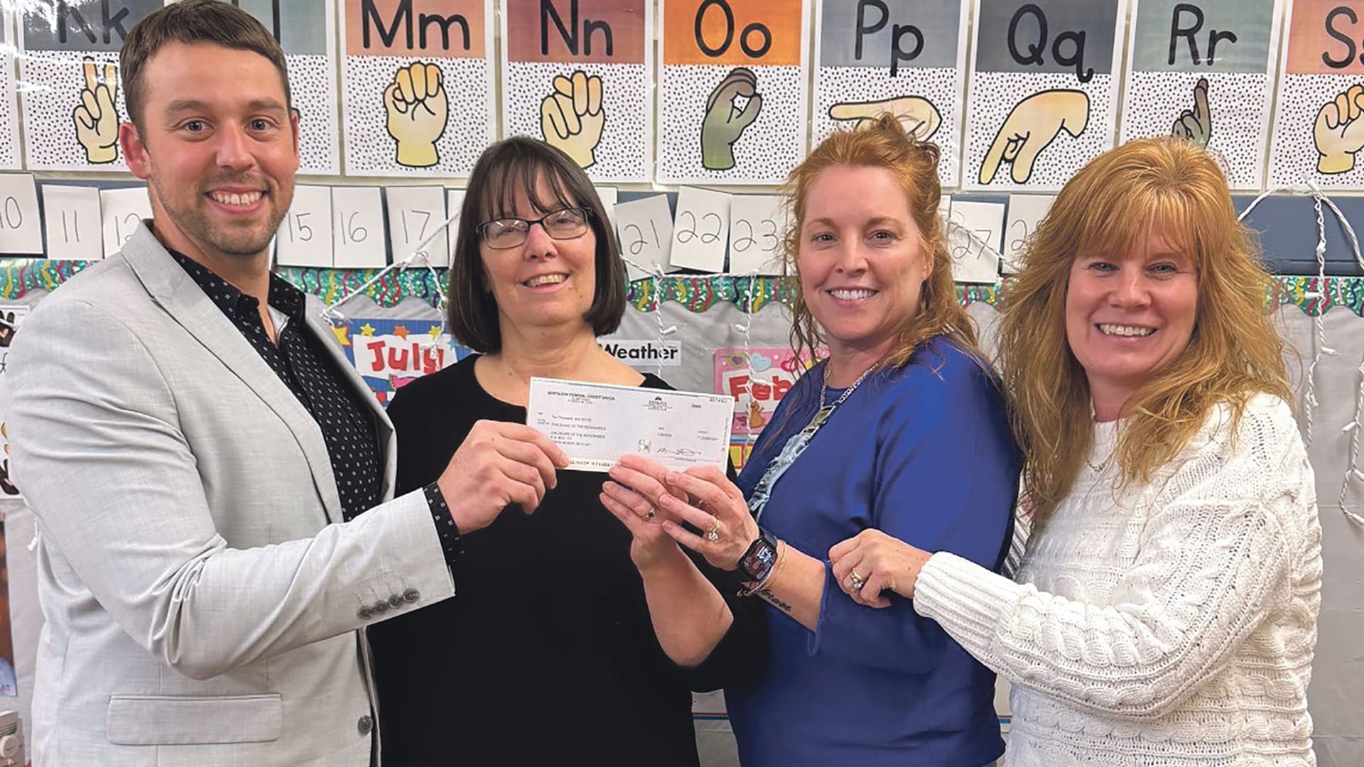 Pictured from left: Johno Hinkell, vice president, market manager at Greylock; Child Care of the Berkshires President and CEO Amy Hall and CFO Billie Jo Sawyer; and Jamie Moncecchi, senior vice president, chief administrative officer at Greylock.