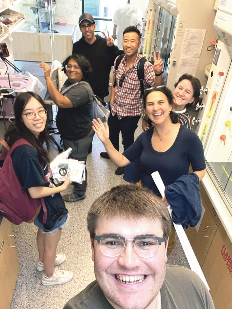 Trisha Andrew (left) and Carolina Aragón (second from right) with their research team members. (Photo by UMass Amherst)